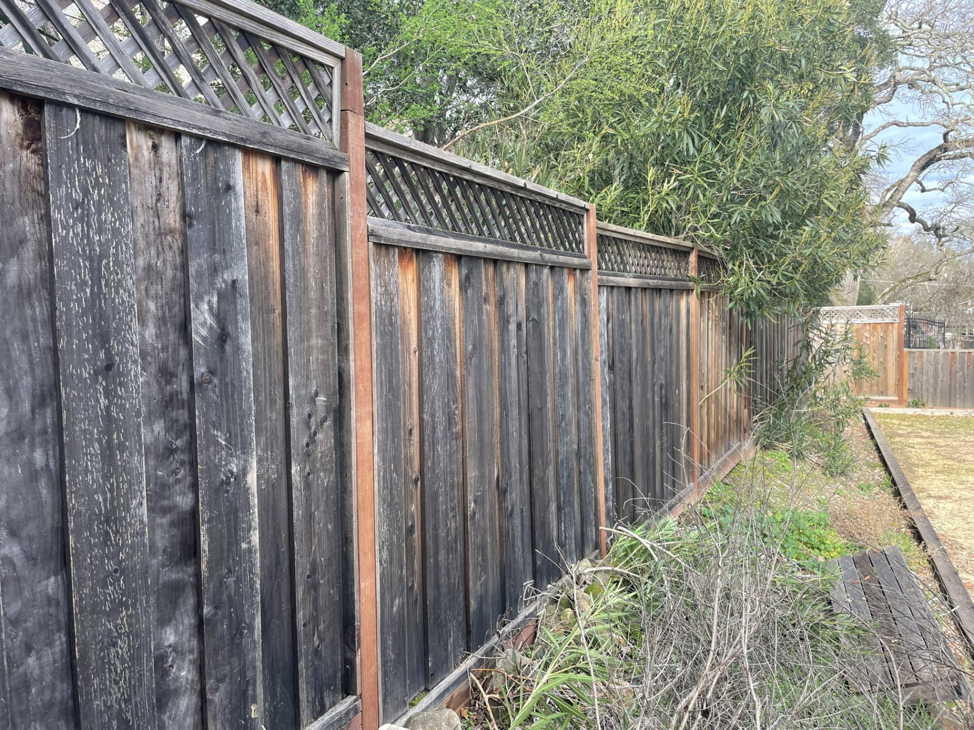 Fence refinishing — before